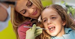 Young girl receiving dental care